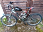 Prodám horské kolo s benzinovým motorem