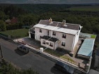 Dva propojené rodinné domy 7+2 se zahradou a výhledem do Českého krasu