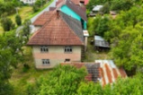 Prodej rodinného domu s velkým stavebním pozemkem