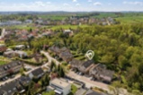 Prostorný byt  s atmosférou rodinného domu - zahrada, krytá terasa, 2x parkovací stání, sklep