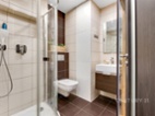 Prodej bytu 4+kk se dvěma koupelnami, saunou a sklepem. 130 m² podlahové plochy, 114 m² užitné plochy.