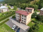 Jedinečná příležitost v srdci Beskyd: Byt 3+1 s parkováním a společnou zahradou