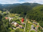 Jedinečná příležitost v srdci Beskyd: Byt 3+1 s parkováním a společnou zahradou