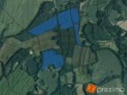Prodej 1/52 pozemků 4592 m2.