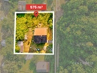 Stavební pozemek 546 m² s chatou a potenciálem u Plzně