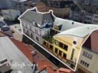 Velký a kompletně pronajatý činžovní dům s byty a nebytovými prostory v centru Kladna