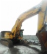 Komatsu 750 PC (80t bagr pásák, r.v. 2005, najeto