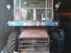Kombajn E 512 s rozbíječem slámy