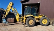 Komatsu WB97 S2 (SPZ) kladivo, r.v. 2004, barva