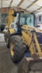 Komatsu WB97 S2 (SPZ) kladivo, r.v. 2004, barva