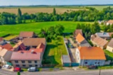 Stavební parcela 1 088 m² s garáží a vlastní studnou – Kokovice (okres Kladno)
