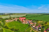 Stavební parcela 1 088 m² s garáží a vlastní studnou – Kokovice (okres Kladno)