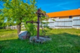 Stavební parcela 1 088 m² s garáží a vlastní studnou – Kokovice (okres Kladno)