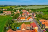 Stavební parcela 1 088 m² s garáží a vlastní studnou – Kokovice (okres Kladno)