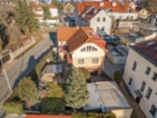 Rodinný dům 7+1 v centru Průhonic