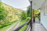 Prodej chaty v Komorní Lhotce na polosamotě se zahradou  207 m2