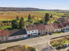 Rodinný dům s komerčním prostorem v centru Řevničova – silný investiční potenciál