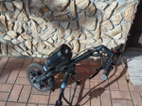 Přídavný elektrický pohon k invalidnímu